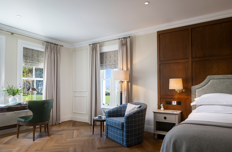 Piazza floor lamp and custom wall light at Dunluce Lodge