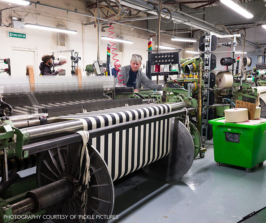 Ian Mankin weaving at mill